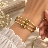 Gold-Tone Multi-Strand Beaded Cuff Bracelet – Elegant Statement Bangle