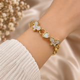 Gold-Tone Butterfly & Heart Crystal Cuff Bracelet – Elegant Statement Bangle