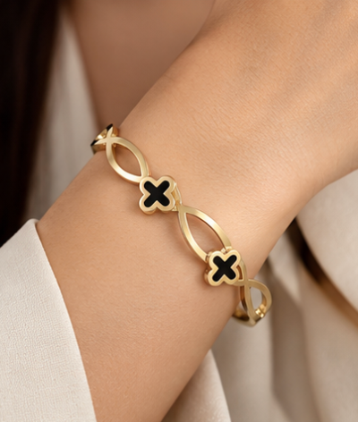Gold-Tone Clover Link Cuff Bracelet – Elegant Statement Bangle