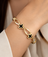 Gold-Tone Clover Link Cuff Bracelet – Elegant Statement Bangle